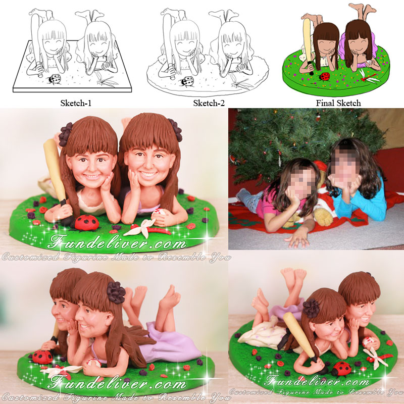 Cute Cake Toppers with Girls Lying on Grass with Shins Crossed and Feet in Air